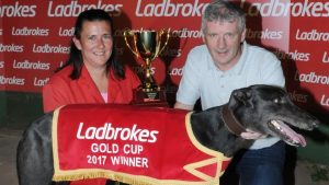 Angela Harrison and Jimmy Wright pose for a photo with Droopys Buick in 2017