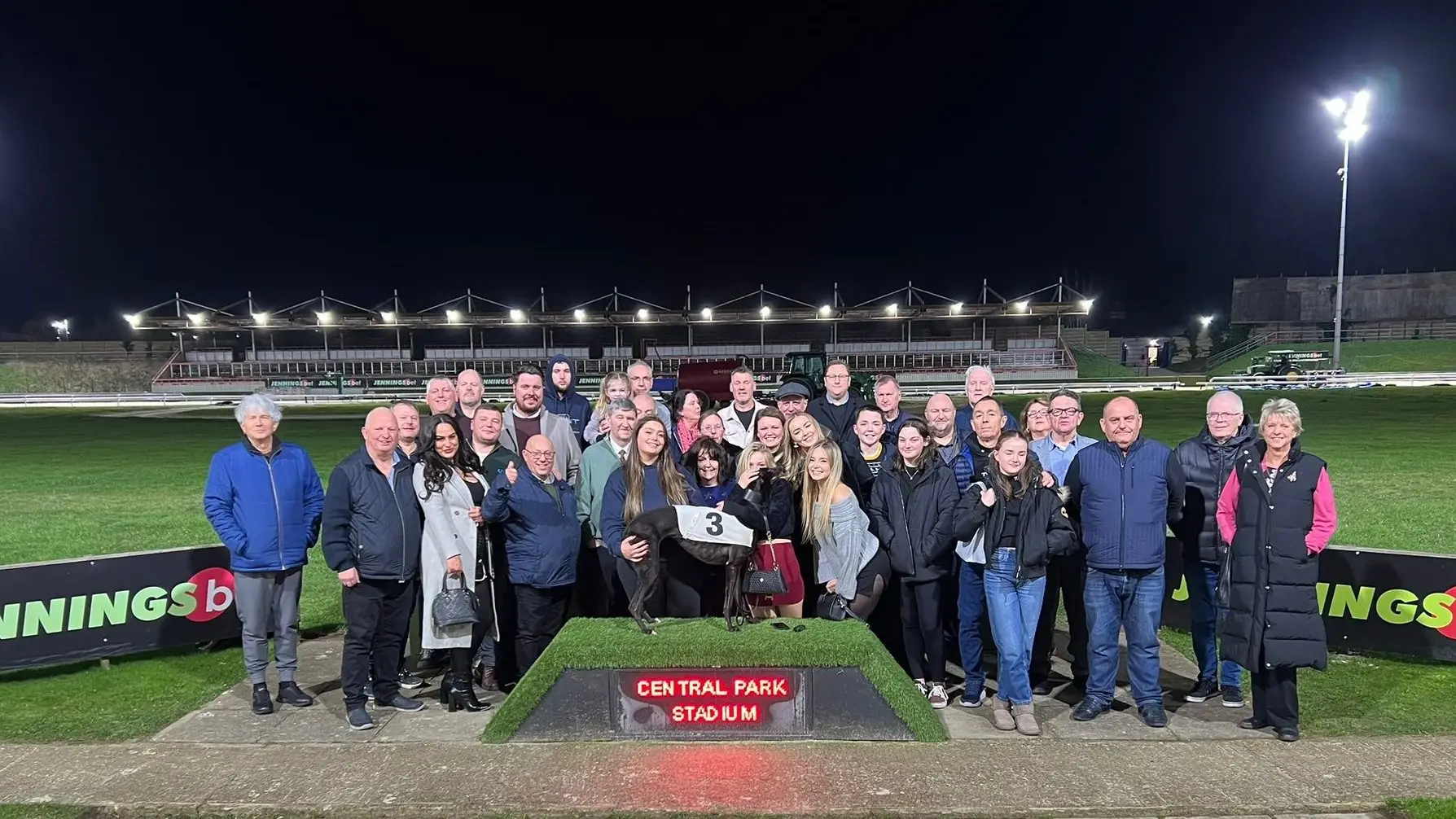 Tony Collett and friends pose for a photo at Central Park upon Tony's retirement